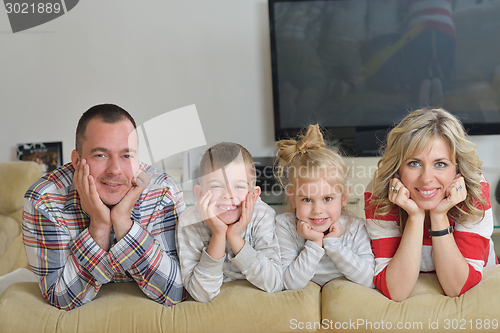 Image of happy young family at home