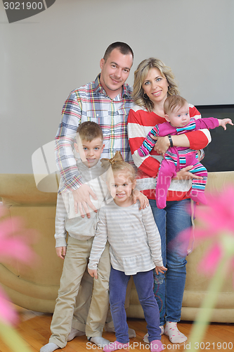 Image of happy young family at home