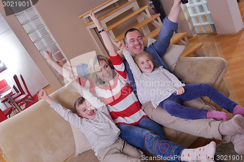 Image of happy young family at home