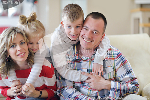 Image of happy young family at home