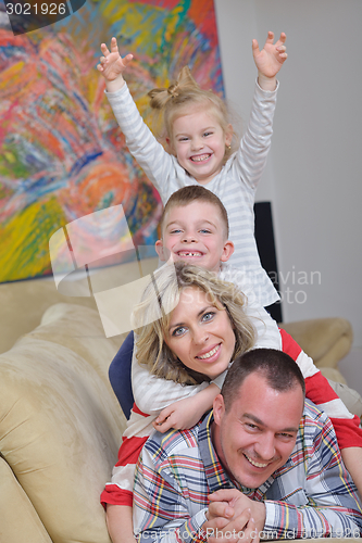 Image of happy young family at home