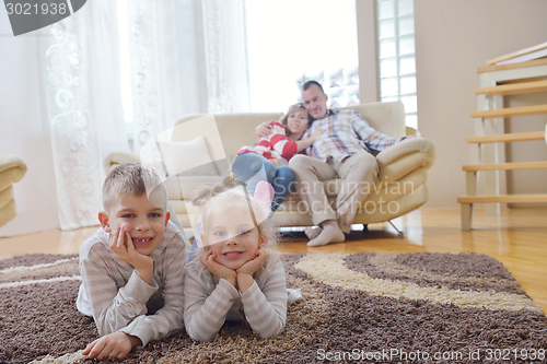 Image of happy young family at home