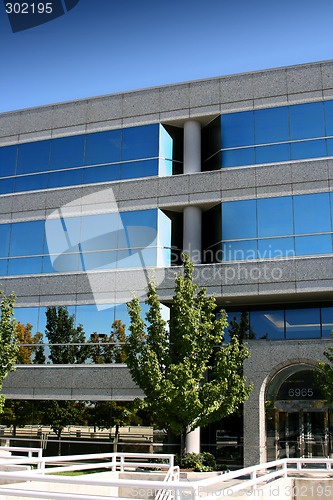 Image of Front of the Mirrored Business Building
