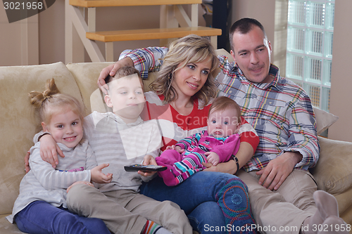 Image of happy young family at home