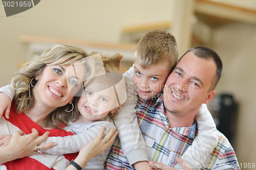 Image of happy young family at home