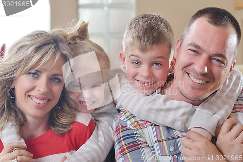 Image of happy young family at home