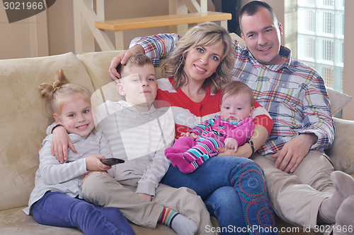 Image of happy young family at home