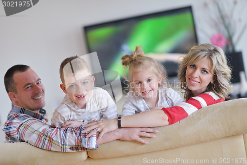 Image of happy young family at home