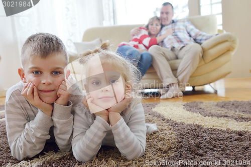 Image of happy young family at home