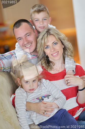 Image of happy young family at home