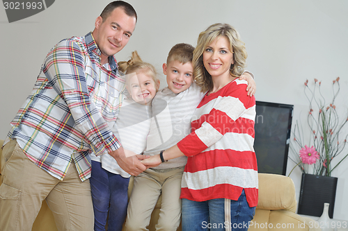 Image of happy young family at home