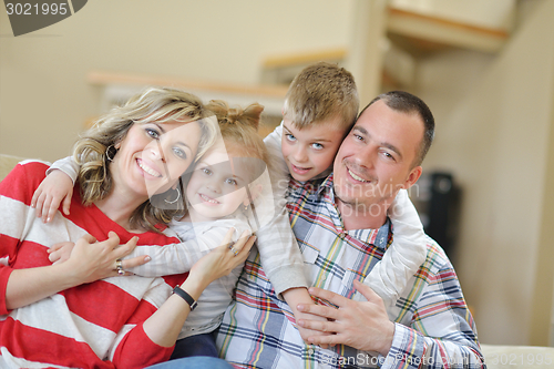 Image of happy young family at home