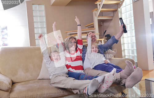 Image of happy young family at home