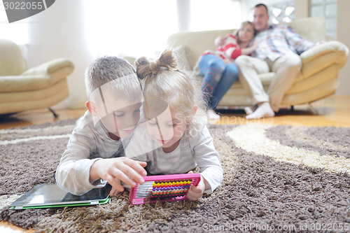 Image of happy young family at home