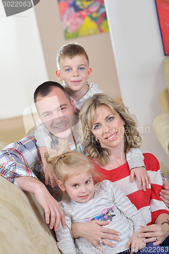 Image of happy young family at home