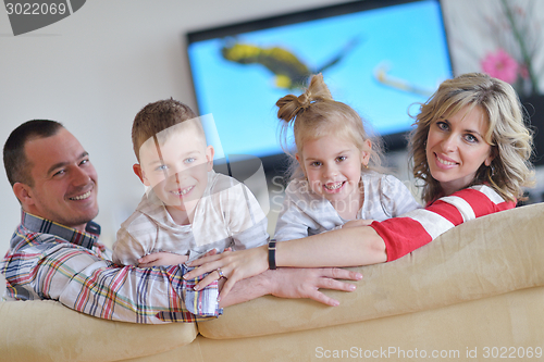 Image of happy young family at home