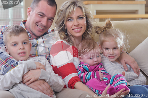 Image of happy young family at home