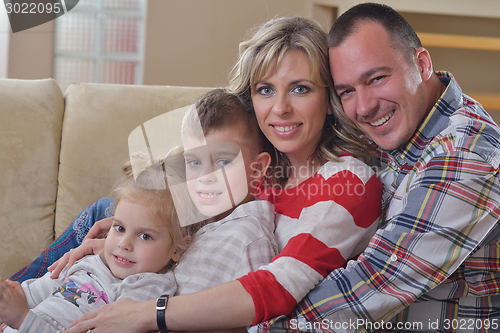 Image of happy young family at home