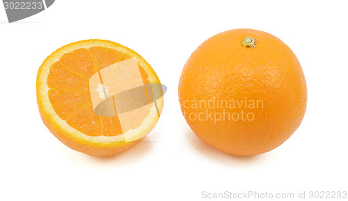 Image of Whole orange and half fruit showing cross section