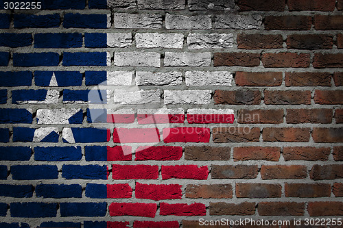 Image of Brick wall texture with flag