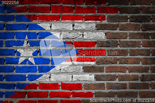 Image of Brick wall texture with flag