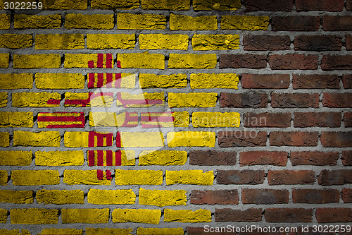 Image of Brick wall texture with flag