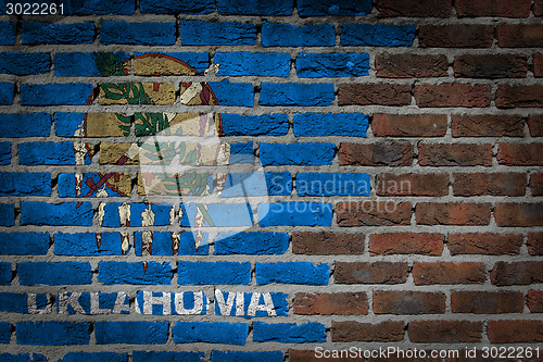 Image of Brick wall texture with flag