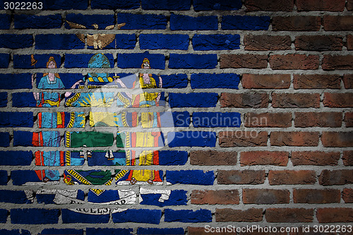 Image of Brick wall texture with flag