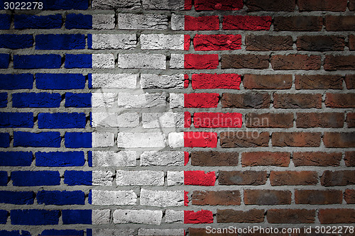 Image of Brick wall texture with flag