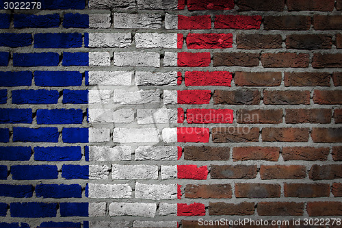 Image of Brick wall texture with flag