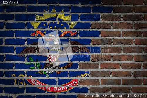 Image of Brick wall texture with flag