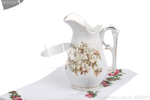 Image of Old flower vase on cloth