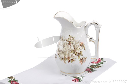 Image of Old flower vase on cloth