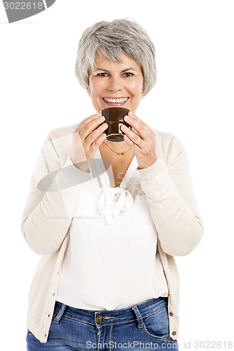 Image of Elderly woman drinking coffee
