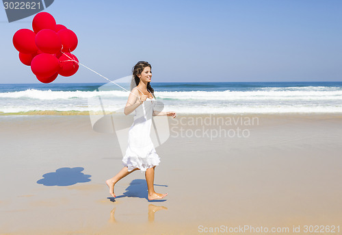 Image of Girl with red balloons