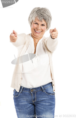 Image of Happy Elderly woman pointing