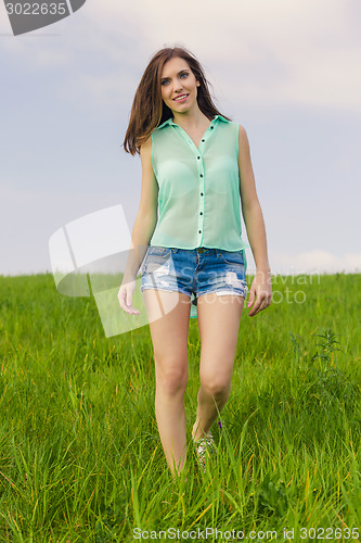 Image of Beautiful girl walking