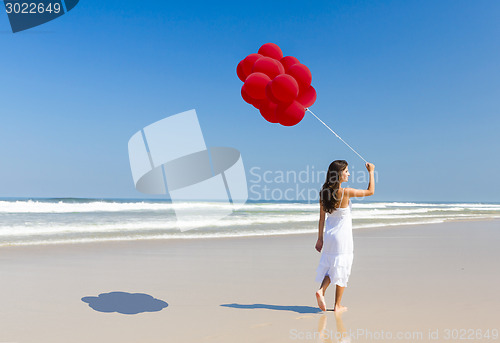 Image of Girl with red balloons