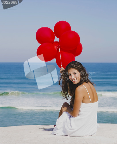 Image of Girl with red balloons