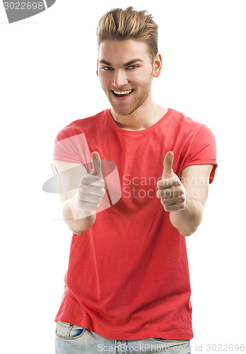 Image of Handsome young man with thumbs up