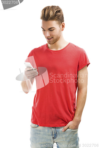 Image of Young man texting