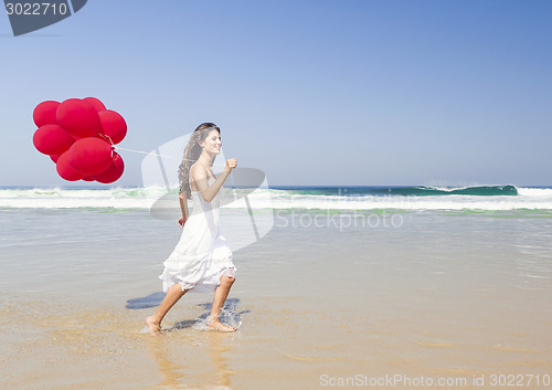 Image of Girl with red balloons