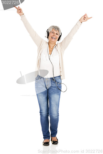 Image of Elderly woman listen music