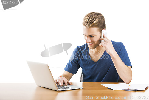 Image of Young man and talking at phone