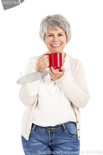 Image of Elderly woman drinking coffee