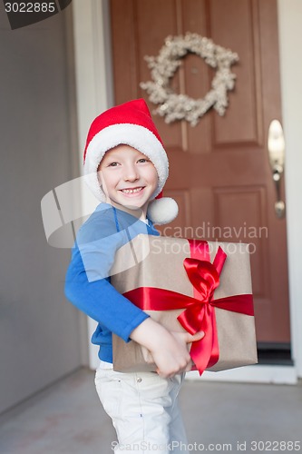 Image of kid at christmas time