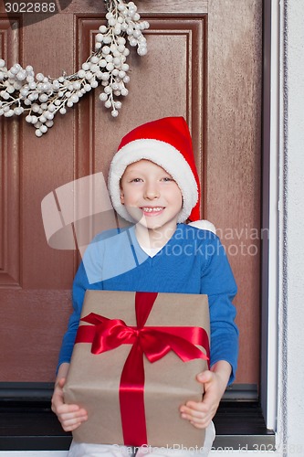 Image of kid at christmas time