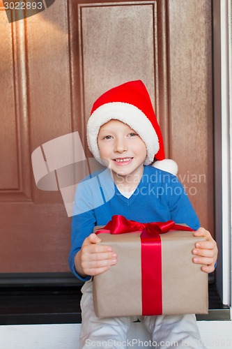 Image of kid at christmas time