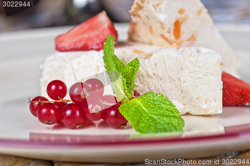 Image of cream berries dessert