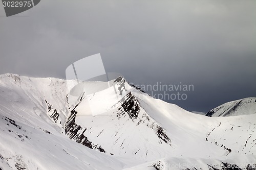 Image of Off-piste slope and gray sky in wind day